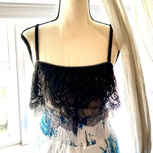 Victoria Secret black lace bralette. Nude mesh underlining. Never worn. No tags